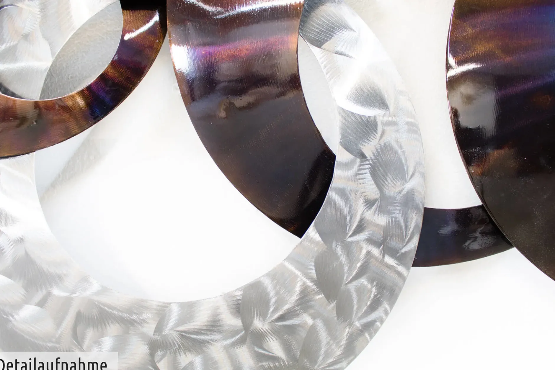 Wanddeko Metall 'Dialog der Kreise' 124x72x8cm