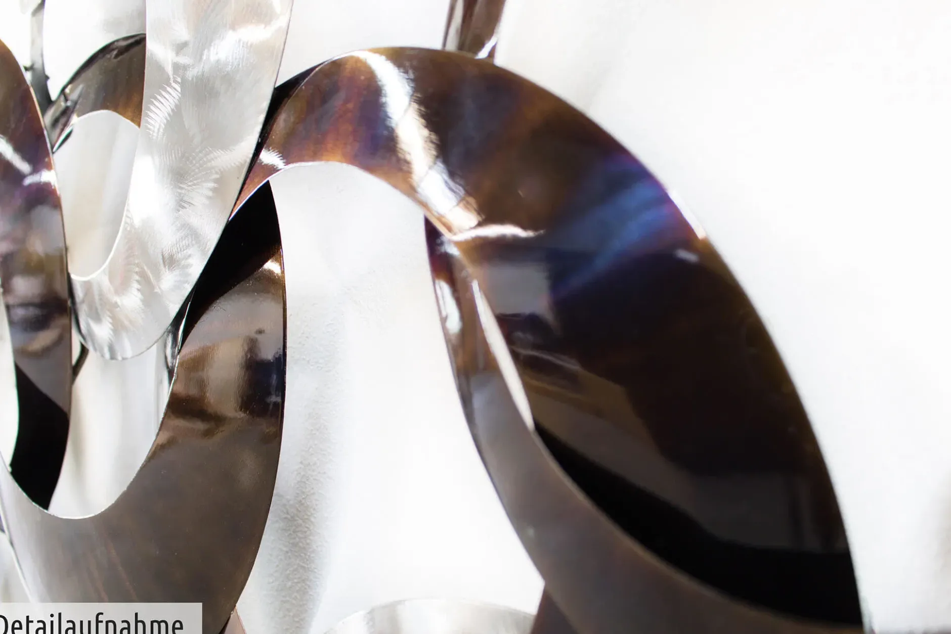 Wanddeko Metall 'Dialog der Kreise' 124x72x8cm
