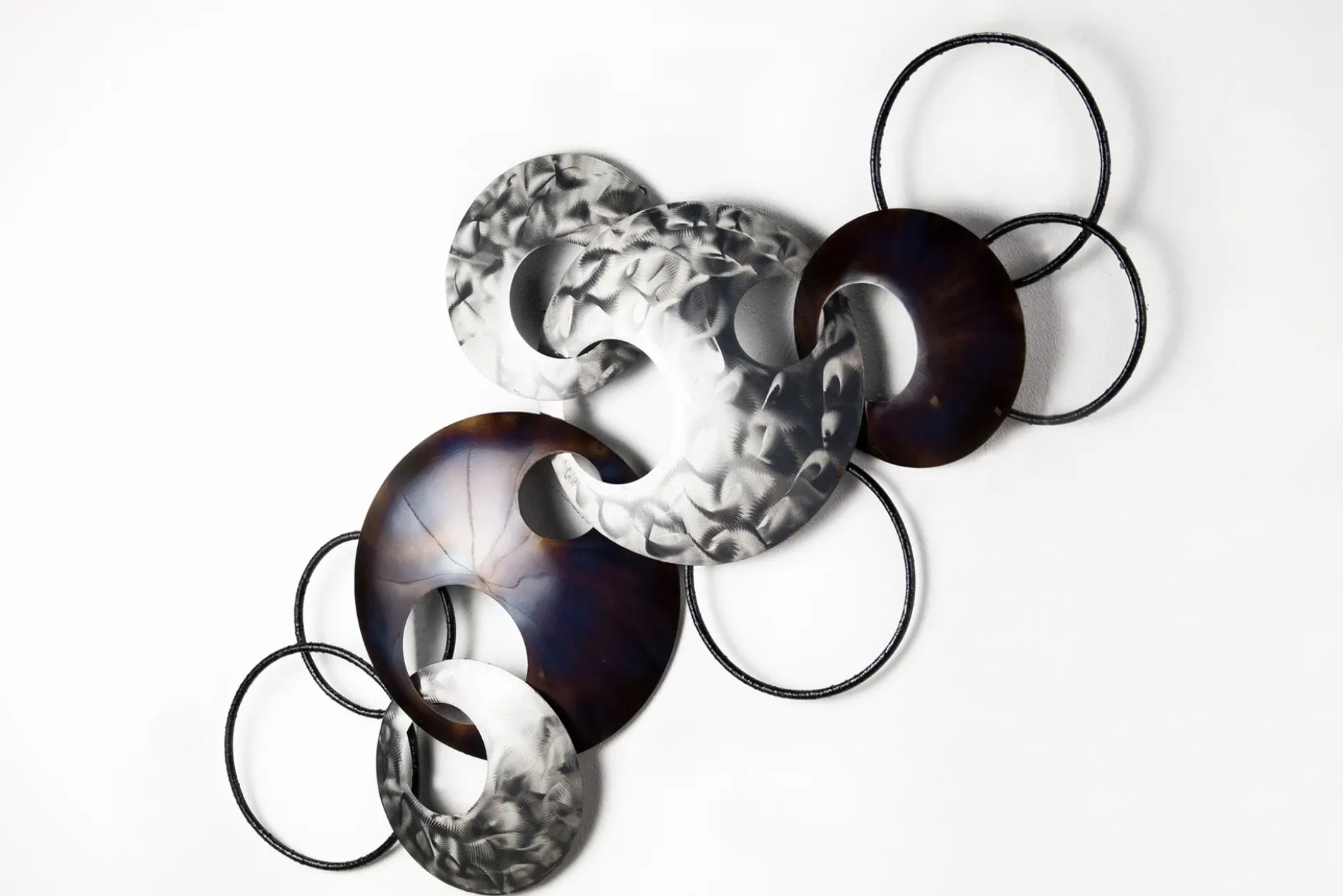 Wanddeko Metall 'Ring um Ring' 106x56x7,5cm